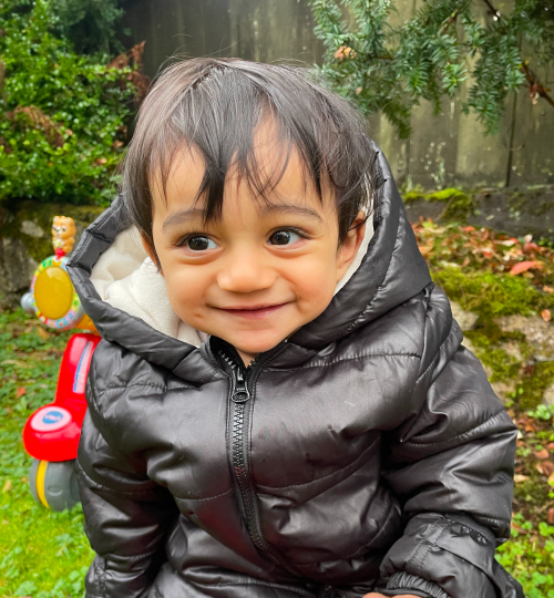 Brentwood Burnaby daycare outdoor playground with children enjoying safe outdoor activities.